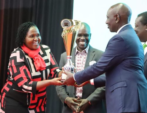 The principal, Katine TTI Receiving a national award from His Excellency The president of Kenya.